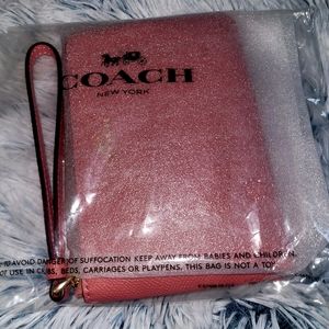 Coach wristlet BNWT color is Taffy